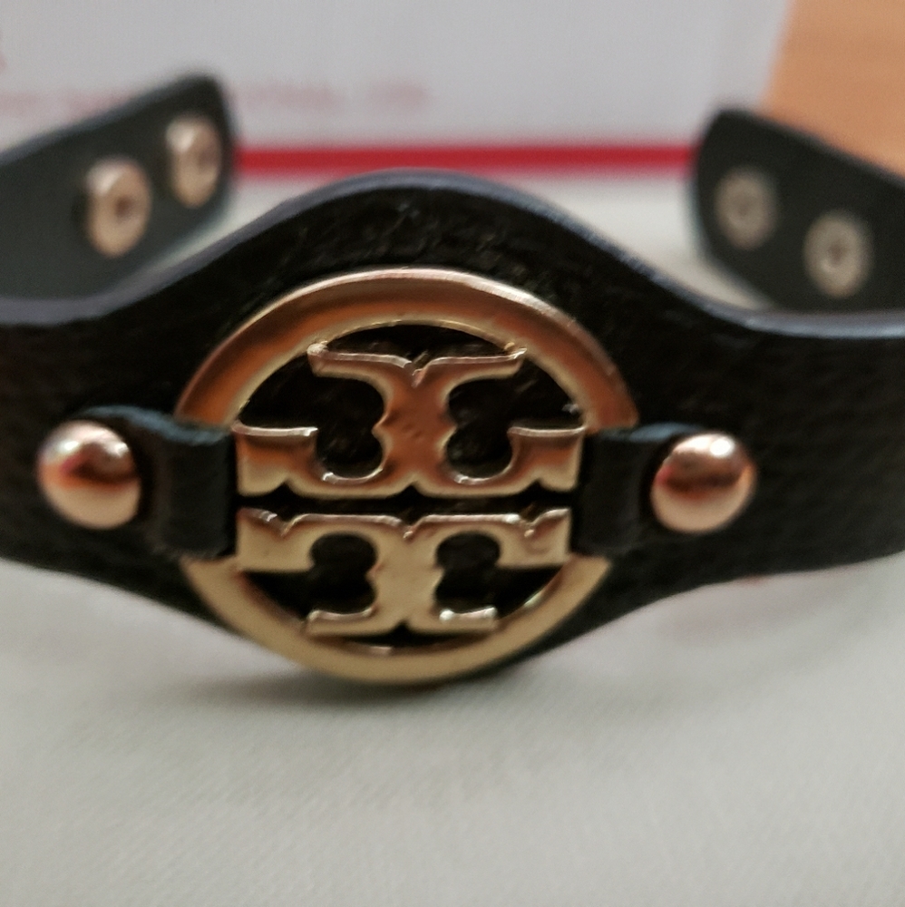 Tory Burch logo bracelet black band snap closer